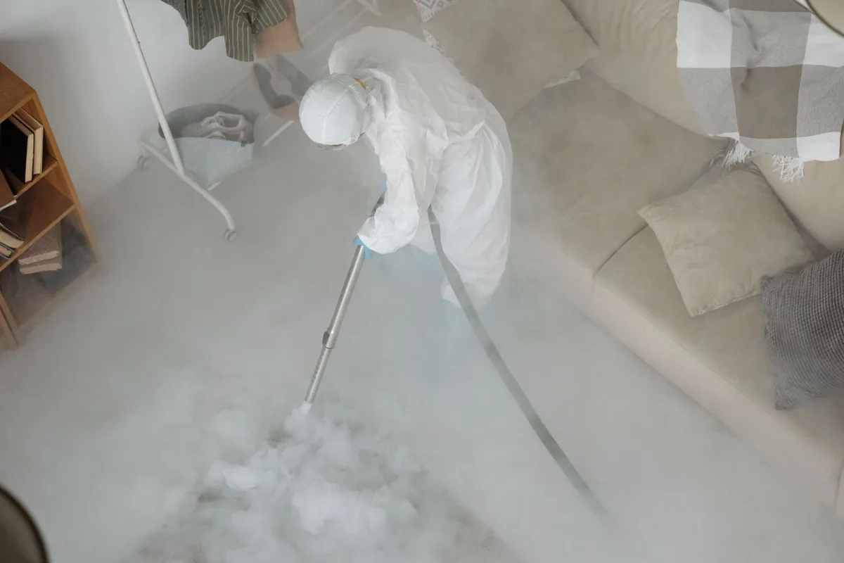 Biohazard cleanup technician in protective equipment, Indian Mountain Lake, PA